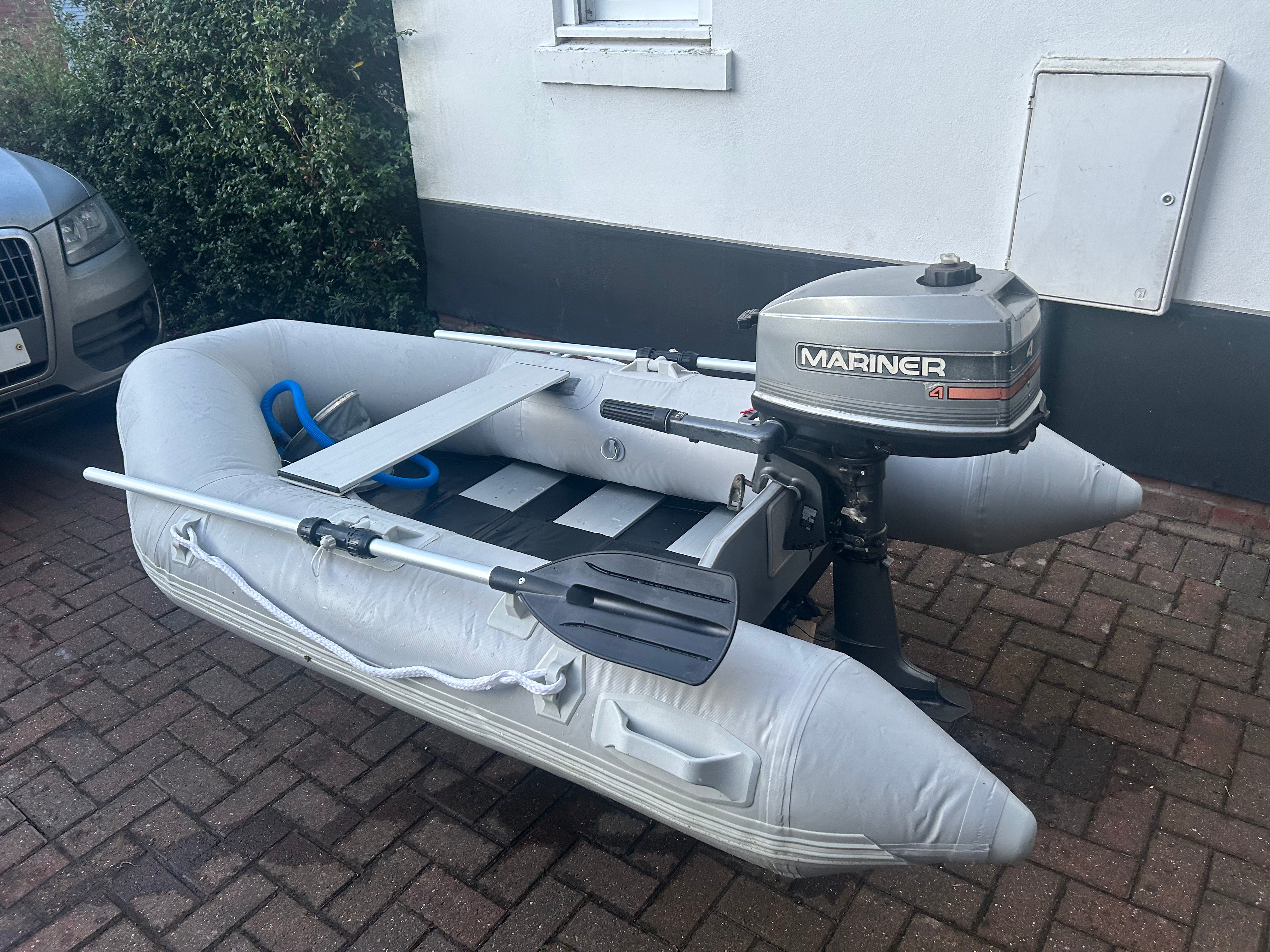 Inflatable dinghy 300 4 man with Mariner 4hp outboard