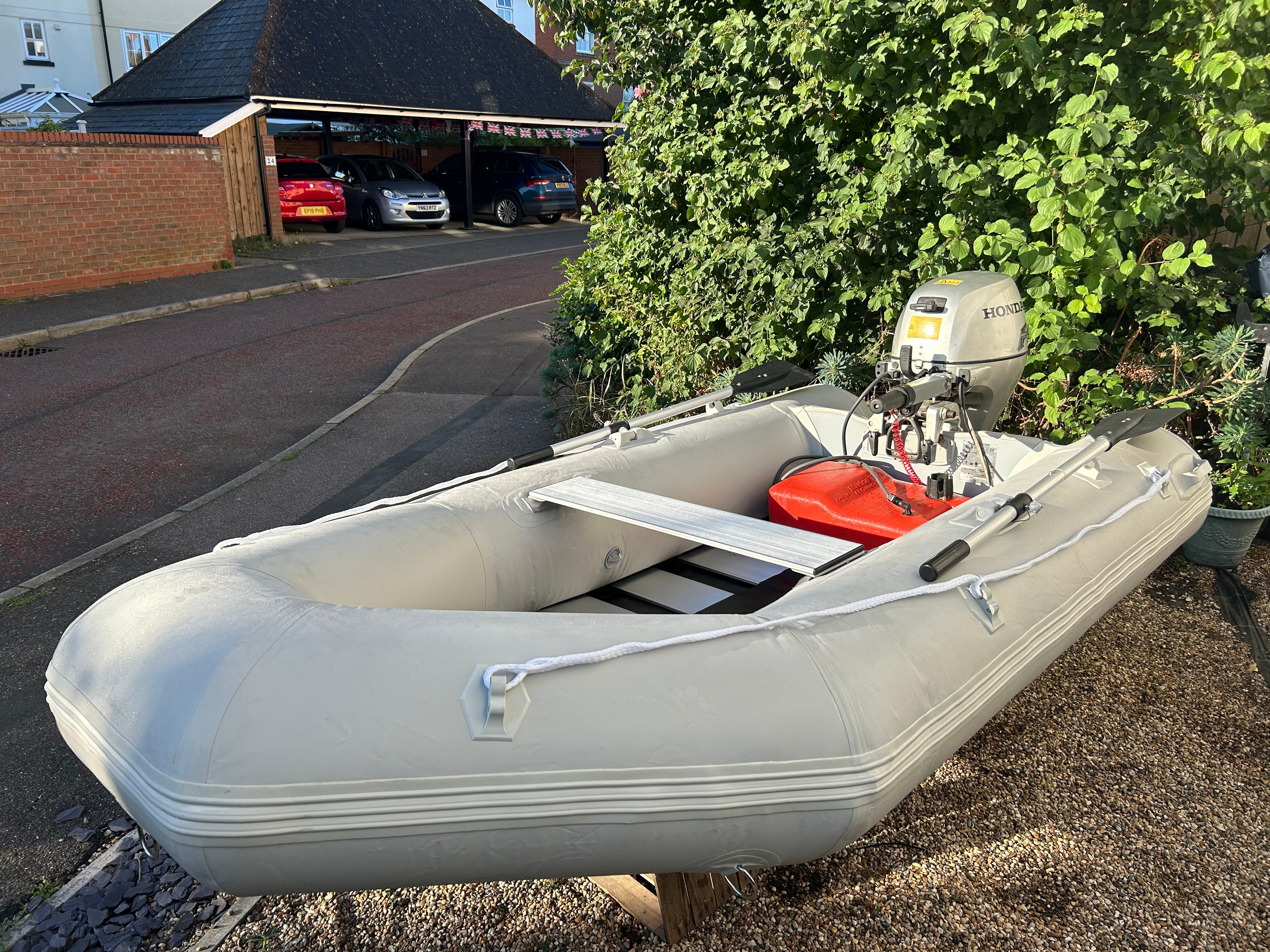 Inflatable dinghy 300 with Honda 10hp outboard.