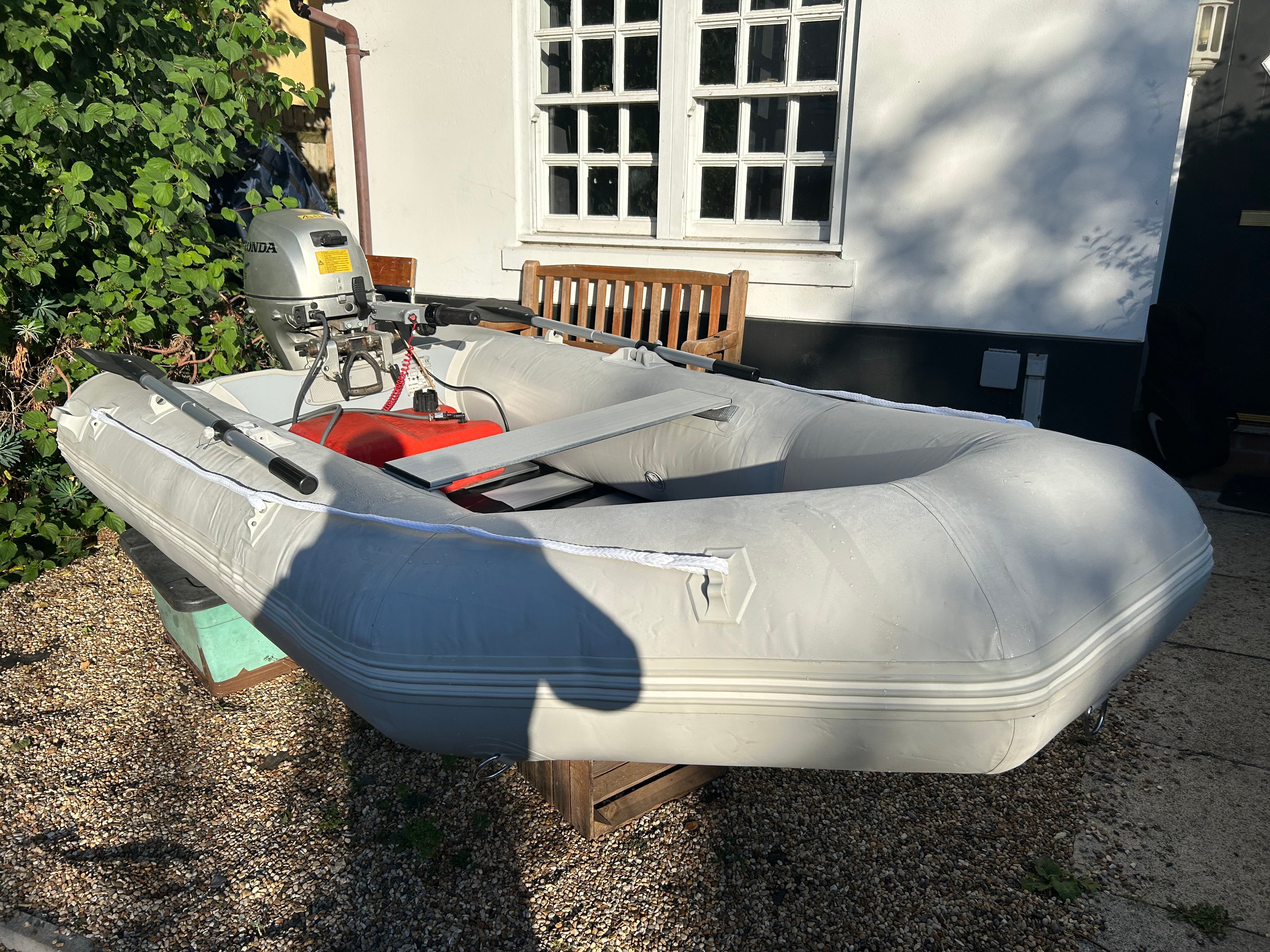 Inflatable dinghy 300 with Honda 10hp outboard.