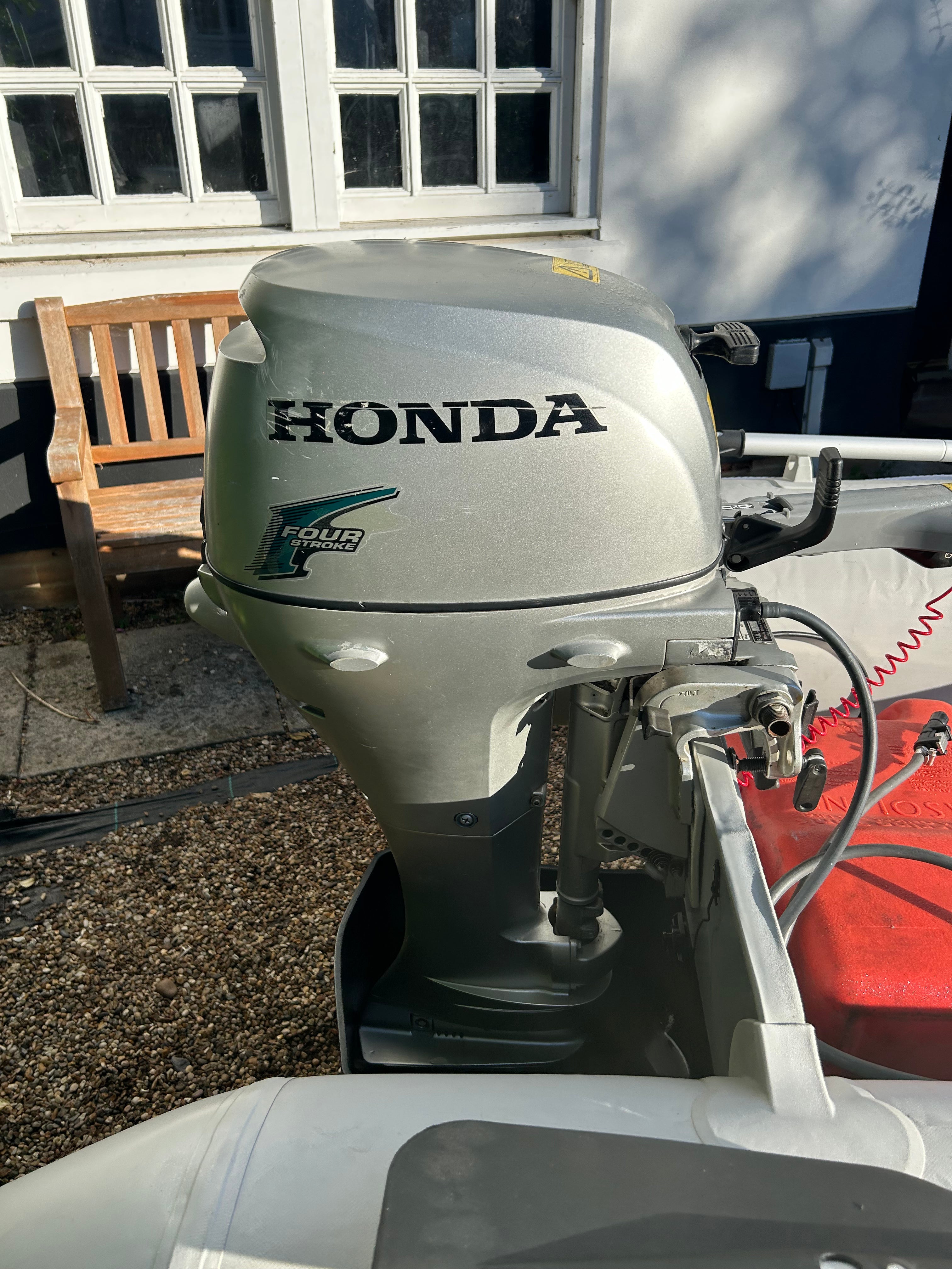 Inflatable dinghy 300 with Honda 10hp outboard.