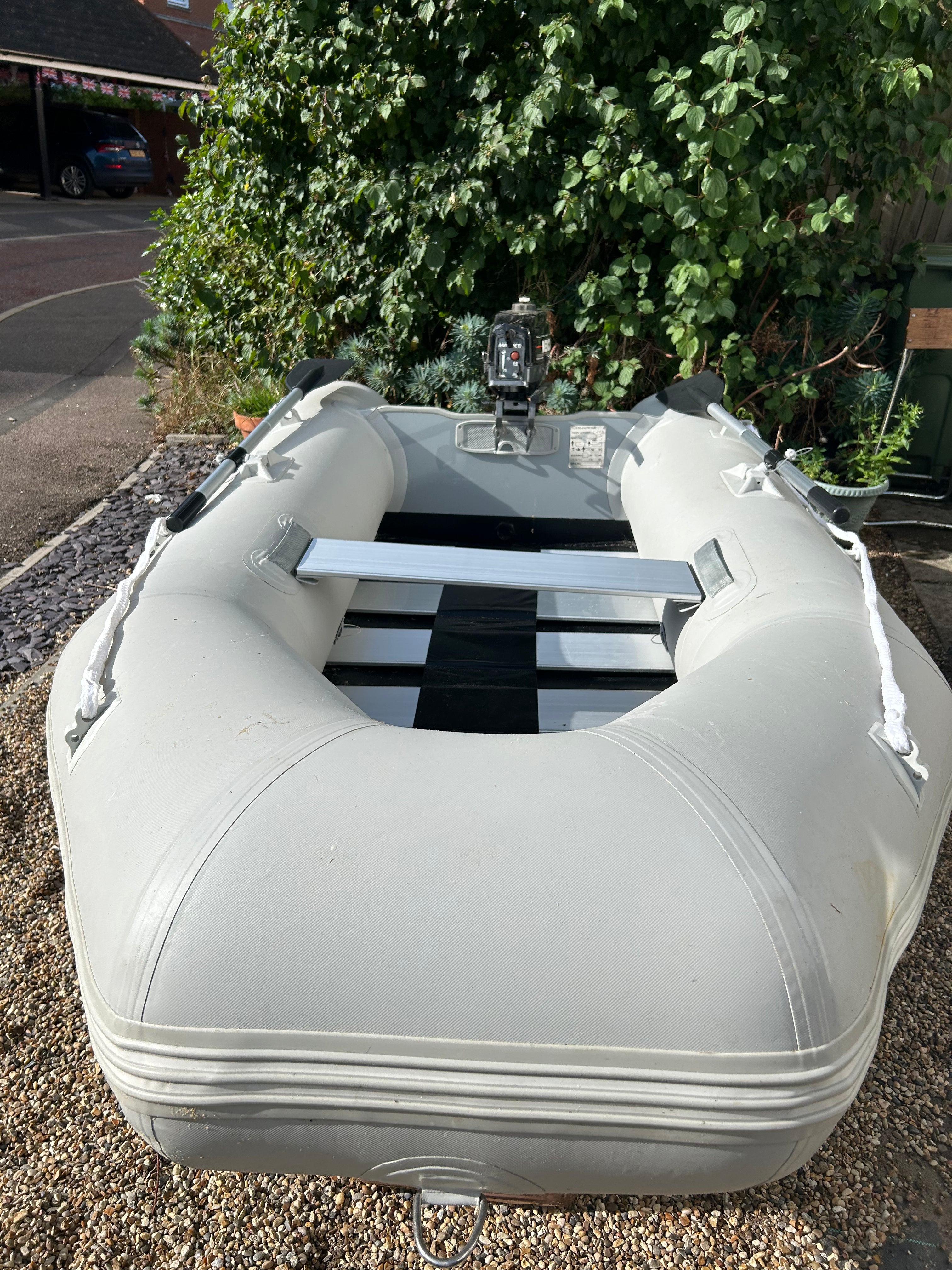 Inflatable dinghy 230 new with Mercury 3.3hp outboard.