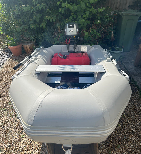 Inflatable dinghy 230 with Mariner 6hp outboard, was £1095