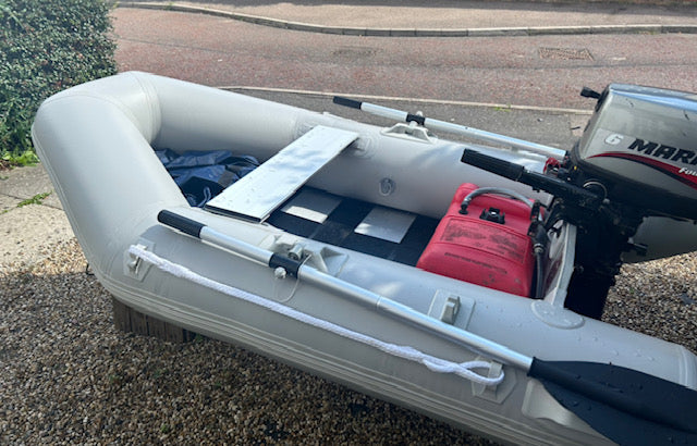 Inflatable dinghy 230 with Mariner 6hp outboard, was £1095