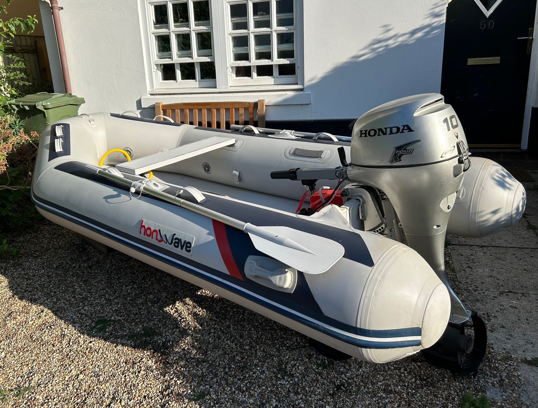 Inflatable Dinghy with Outboard Sailing Matters